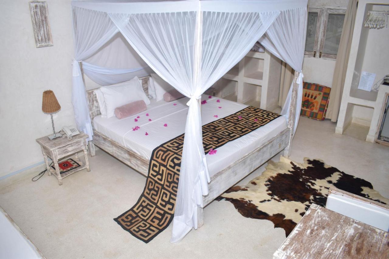 The Villa Luxury Suites Hotel Diani Beach Extérieur photo