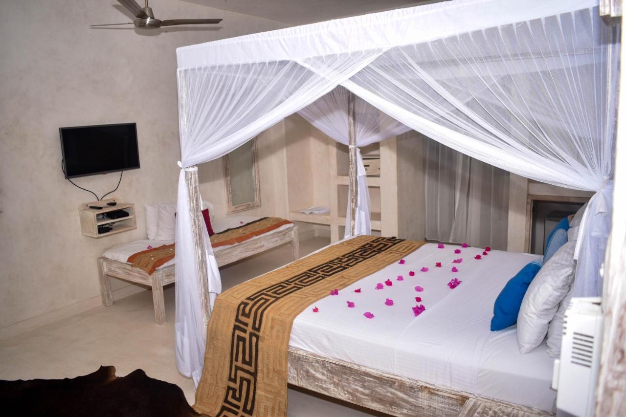 The Villa Luxury Suites Hotel Diani Beach Extérieur photo