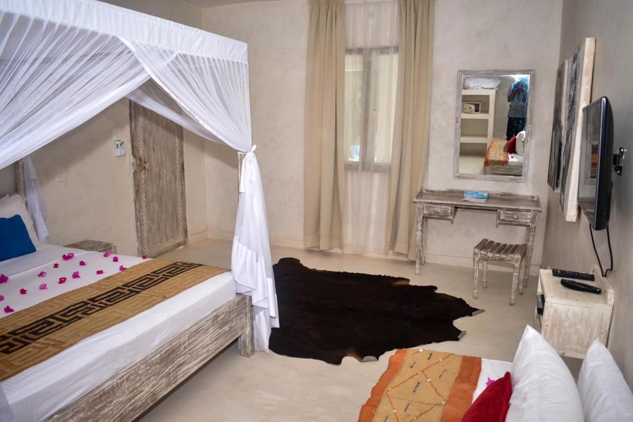 The Villa Luxury Suites Hotel Diani Beach Extérieur photo