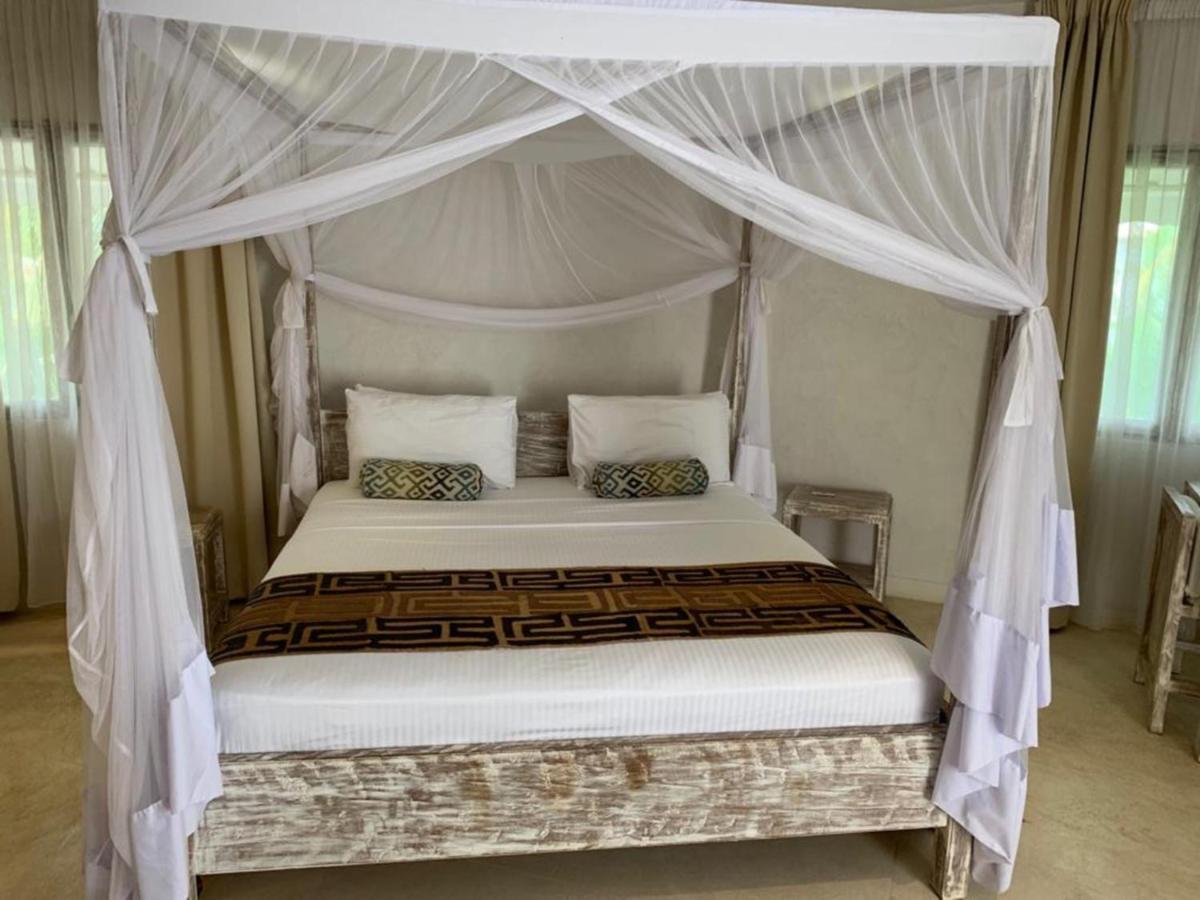 The Villa Luxury Suites Hotel Diani Beach Extérieur photo