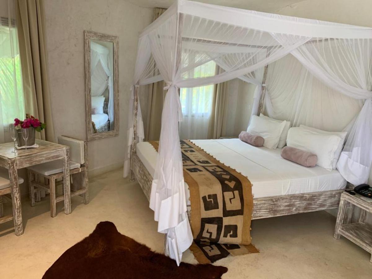 The Villa Luxury Suites Hotel Diani Beach Extérieur photo