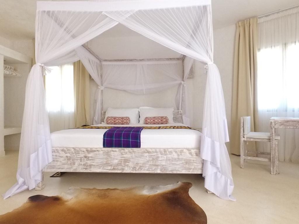 The Villa Luxury Suites Hotel Diani Beach Extérieur photo