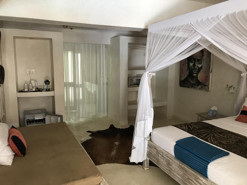 The Villa Luxury Suites Hotel Diani Beach Extérieur photo