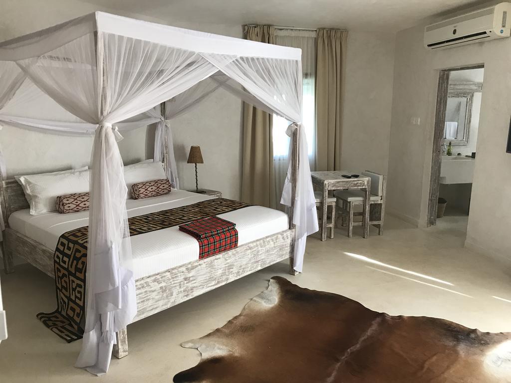 The Villa Luxury Suites Hotel Diani Beach Extérieur photo